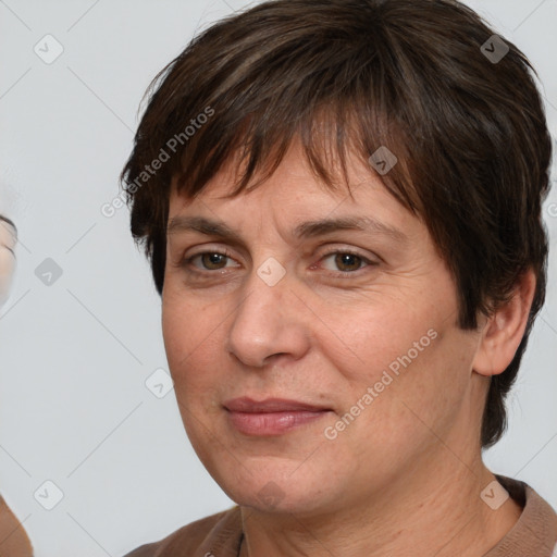 Joyful white adult female with short  brown hair and brown eyes