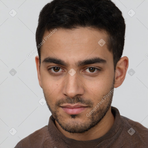 Neutral white young-adult male with short  black hair and brown eyes