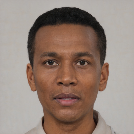 Neutral black adult male with short  black hair and brown eyes