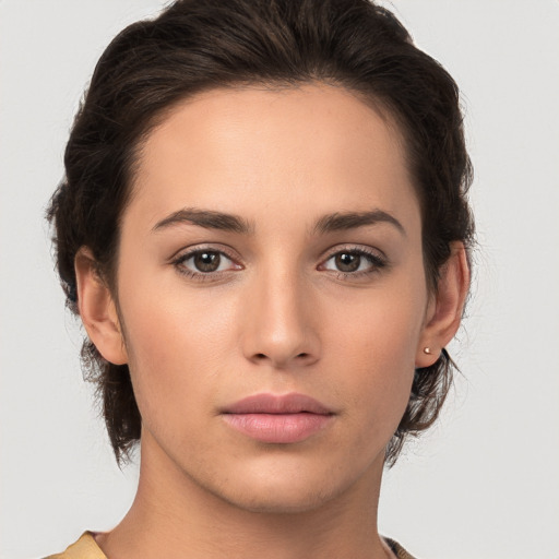 Neutral white young-adult female with medium  brown hair and brown eyes