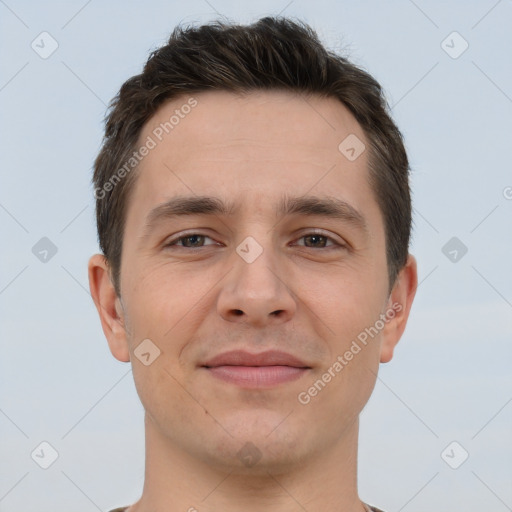 Joyful white young-adult male with short  brown hair and brown eyes