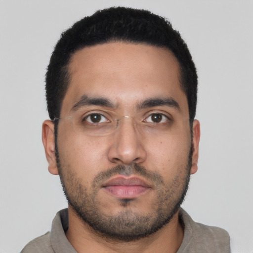 Neutral white young-adult male with short  black hair and brown eyes