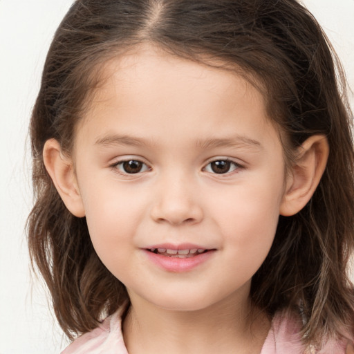 Joyful white child female with medium  brown hair and brown eyes