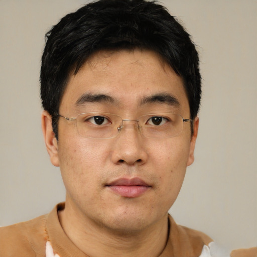 Neutral asian young-adult male with short  brown hair and brown eyes