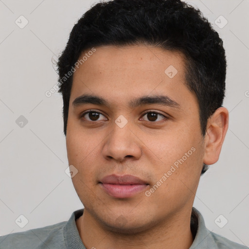 Neutral latino young-adult male with short  black hair and brown eyes