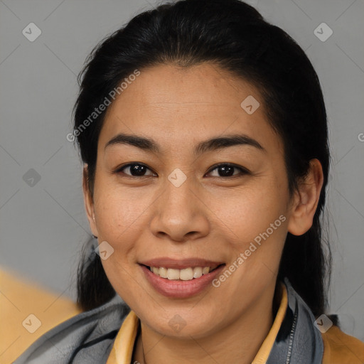 Joyful latino young-adult female with medium  brown hair and brown eyes