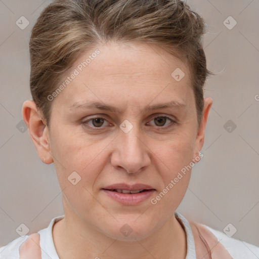 Joyful white young-adult female with short  brown hair and grey eyes