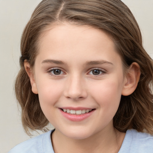 Joyful white child female with medium  brown hair and brown eyes