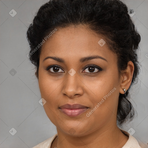 Joyful black young-adult female with medium  brown hair and brown eyes