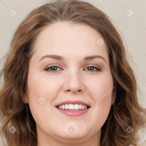 Joyful white young-adult female with long  brown hair and green eyes