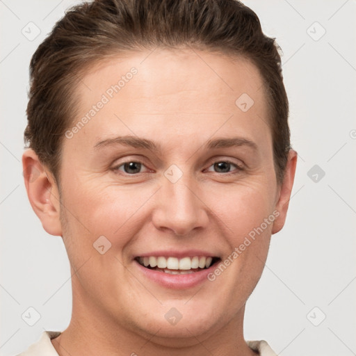 Joyful white young-adult female with short  brown hair and grey eyes