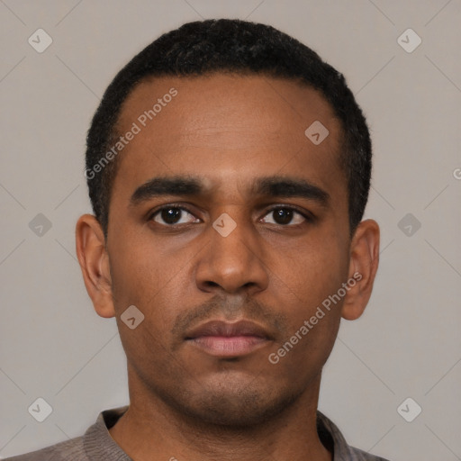 Neutral latino young-adult male with short  black hair and brown eyes