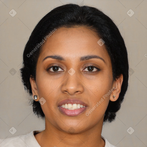 Joyful black young-adult female with medium  black hair and brown eyes