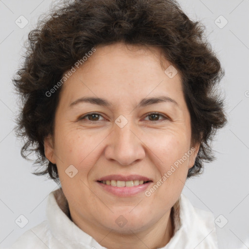 Joyful white adult female with short  brown hair and brown eyes