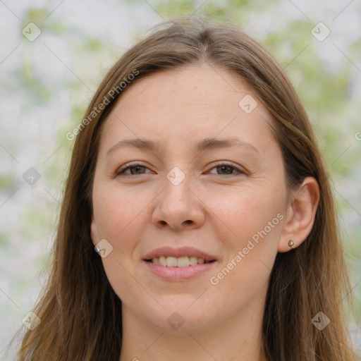 Joyful white young-adult female with long  brown hair and blue eyes