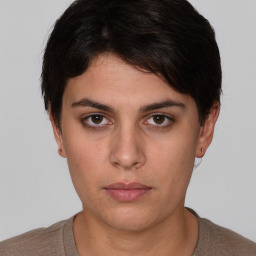 Neutral white young-adult female with short  brown hair and brown eyes