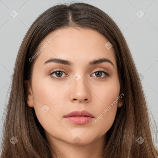 Neutral white young-adult female with long  brown hair and brown eyes