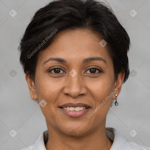 Joyful white adult female with short  brown hair and brown eyes