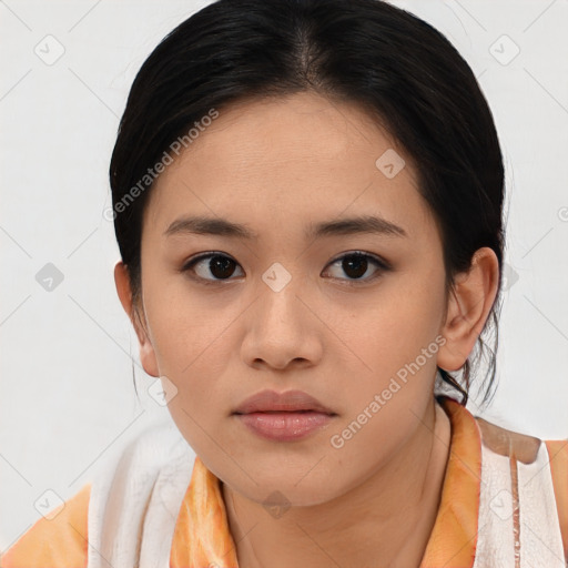 Neutral asian young-adult female with medium  brown hair and brown eyes