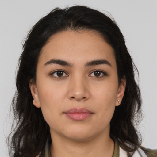 Neutral latino young-adult female with medium  brown hair and brown eyes