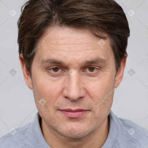 Joyful white adult male with short  brown hair and grey eyes