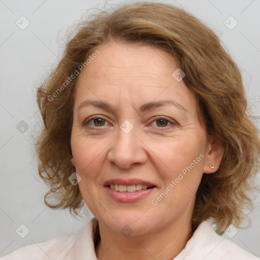 Joyful white adult female with medium  brown hair and brown eyes