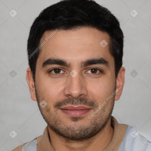 Joyful white young-adult male with short  black hair and brown eyes