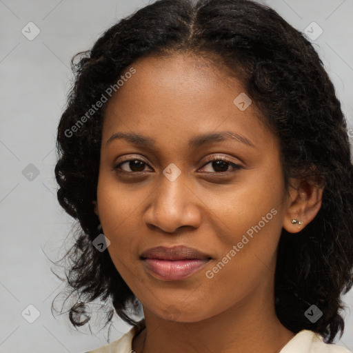 Joyful black young-adult female with medium  brown hair and brown eyes