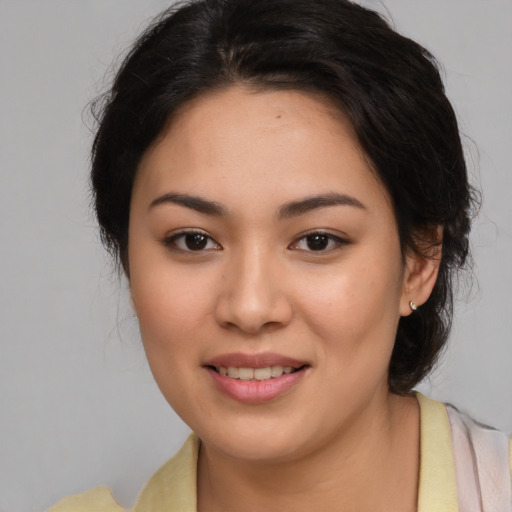 Joyful white young-adult female with medium  brown hair and brown eyes