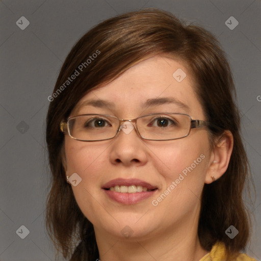 Joyful white adult female with medium  brown hair and brown eyes