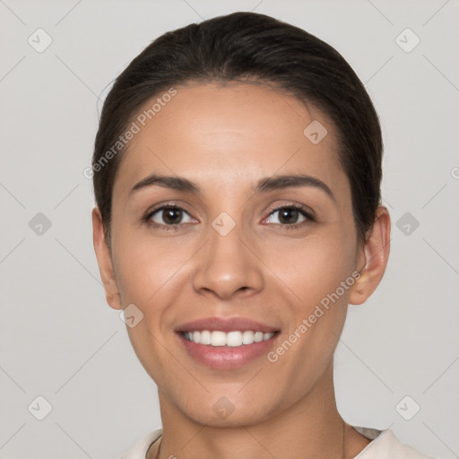 Joyful white young-adult female with short  brown hair and brown eyes