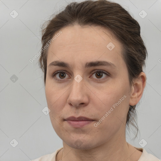 Neutral white young-adult female with medium  brown hair and brown eyes