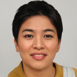 Joyful asian young-adult female with short  brown hair and brown eyes