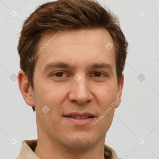 Joyful white adult male with short  brown hair and grey eyes