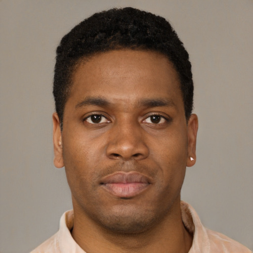 Neutral latino young-adult male with short  brown hair and brown eyes