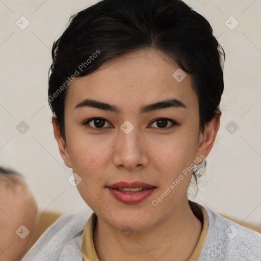 Joyful asian young-adult female with short  black hair and brown eyes