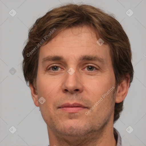 Neutral white adult male with short  brown hair and brown eyes