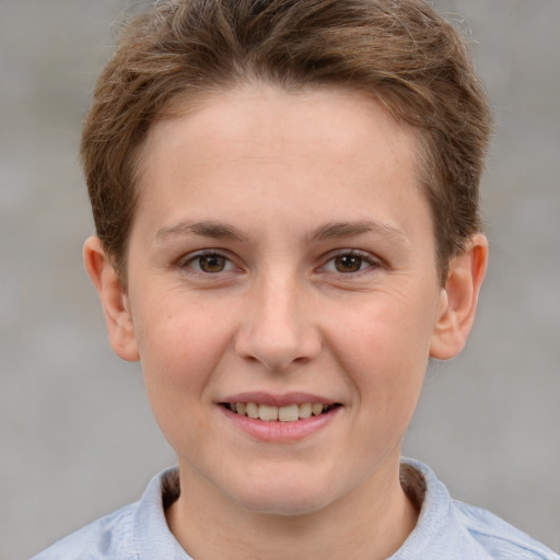 Joyful white young-adult female with short  brown hair and grey eyes