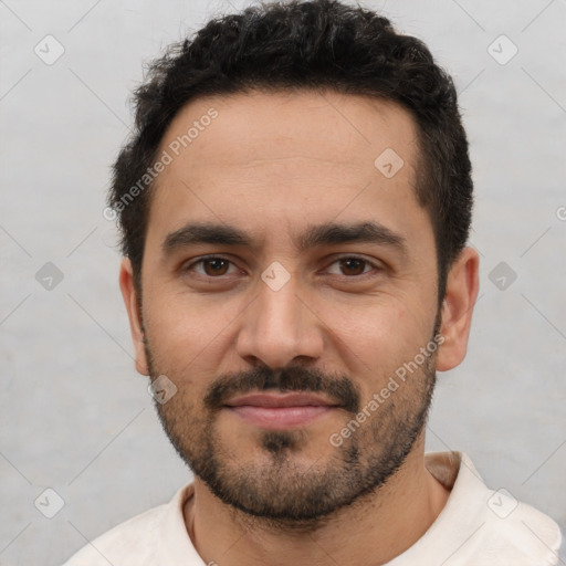 Joyful white young-adult male with short  black hair and brown eyes