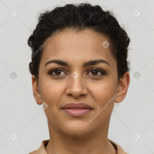 Joyful latino young-adult female with short  brown hair and brown eyes