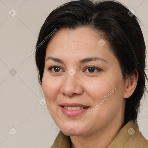 Joyful white adult female with medium  brown hair and brown eyes