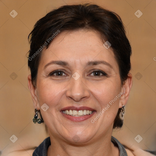 Joyful white adult female with medium  brown hair and brown eyes