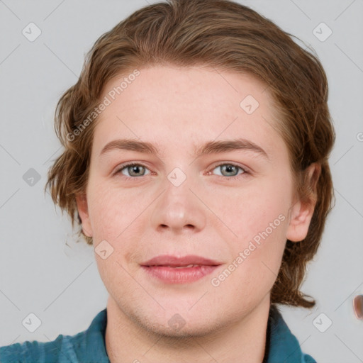 Joyful white young-adult female with medium  brown hair and blue eyes