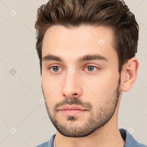 Neutral white young-adult male with short  brown hair and brown eyes