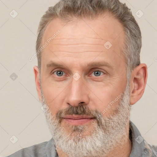 Neutral white middle-aged male with short  brown hair and brown eyes