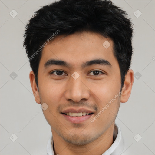 Joyful asian young-adult male with short  black hair and brown eyes