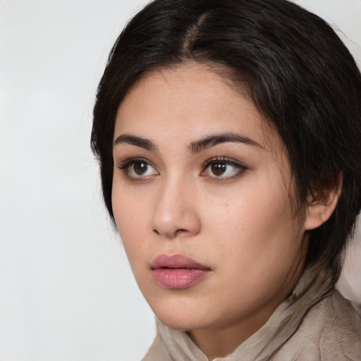 Neutral white young-adult female with medium  brown hair and brown eyes