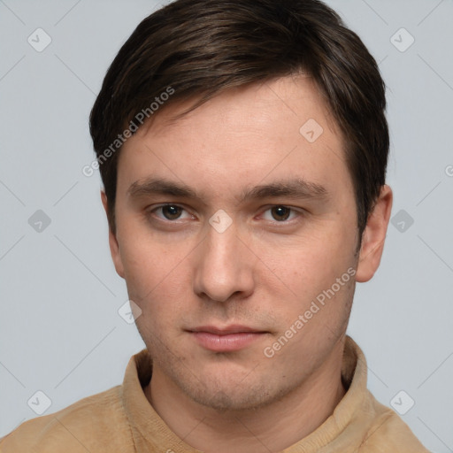 Neutral white young-adult male with short  brown hair and brown eyes