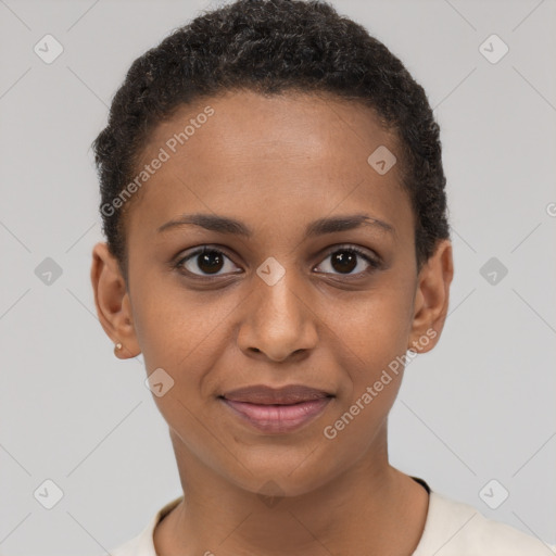 Joyful black young-adult female with short  brown hair and brown eyes