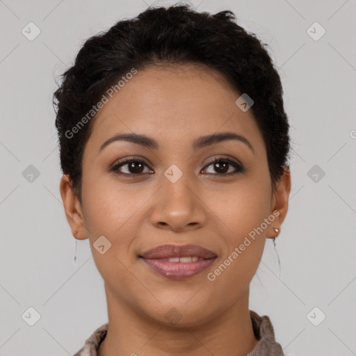 Joyful latino young-adult female with short  brown hair and brown eyes